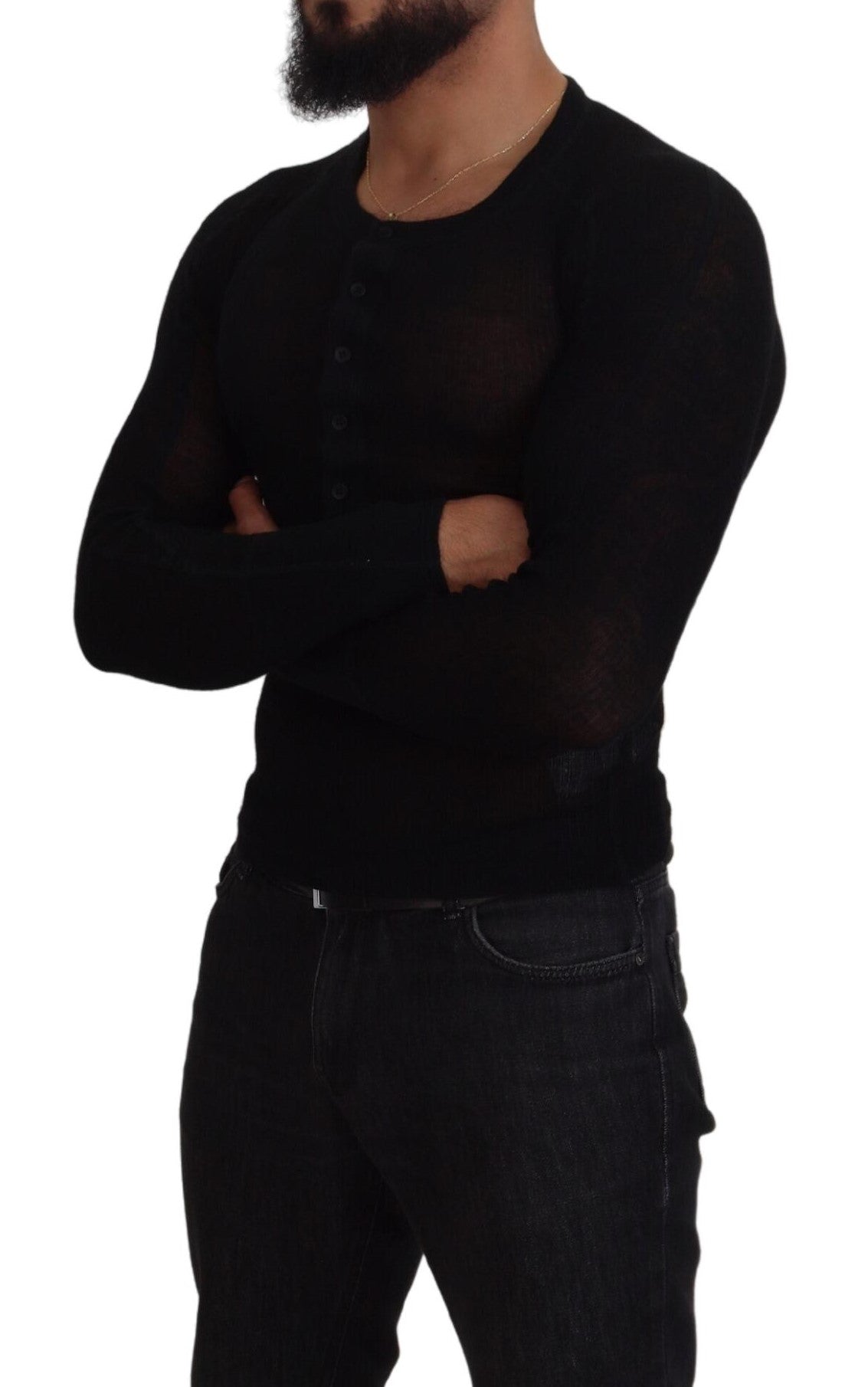 Man wearing black shirt with arms crossed