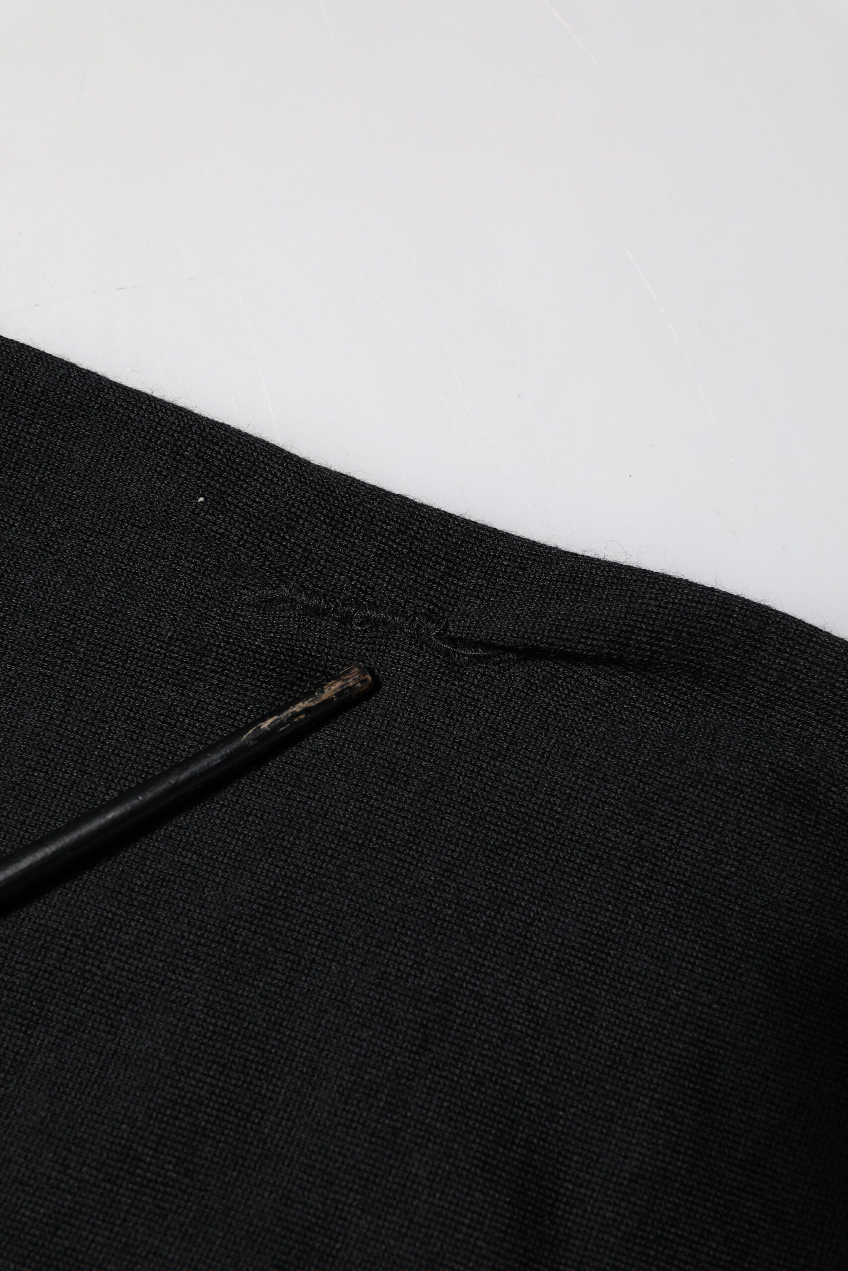 Black denim jeans with a zipper fly