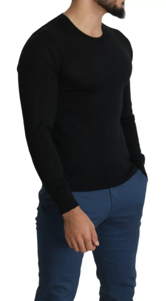 Man wearing black shirt and blue pants