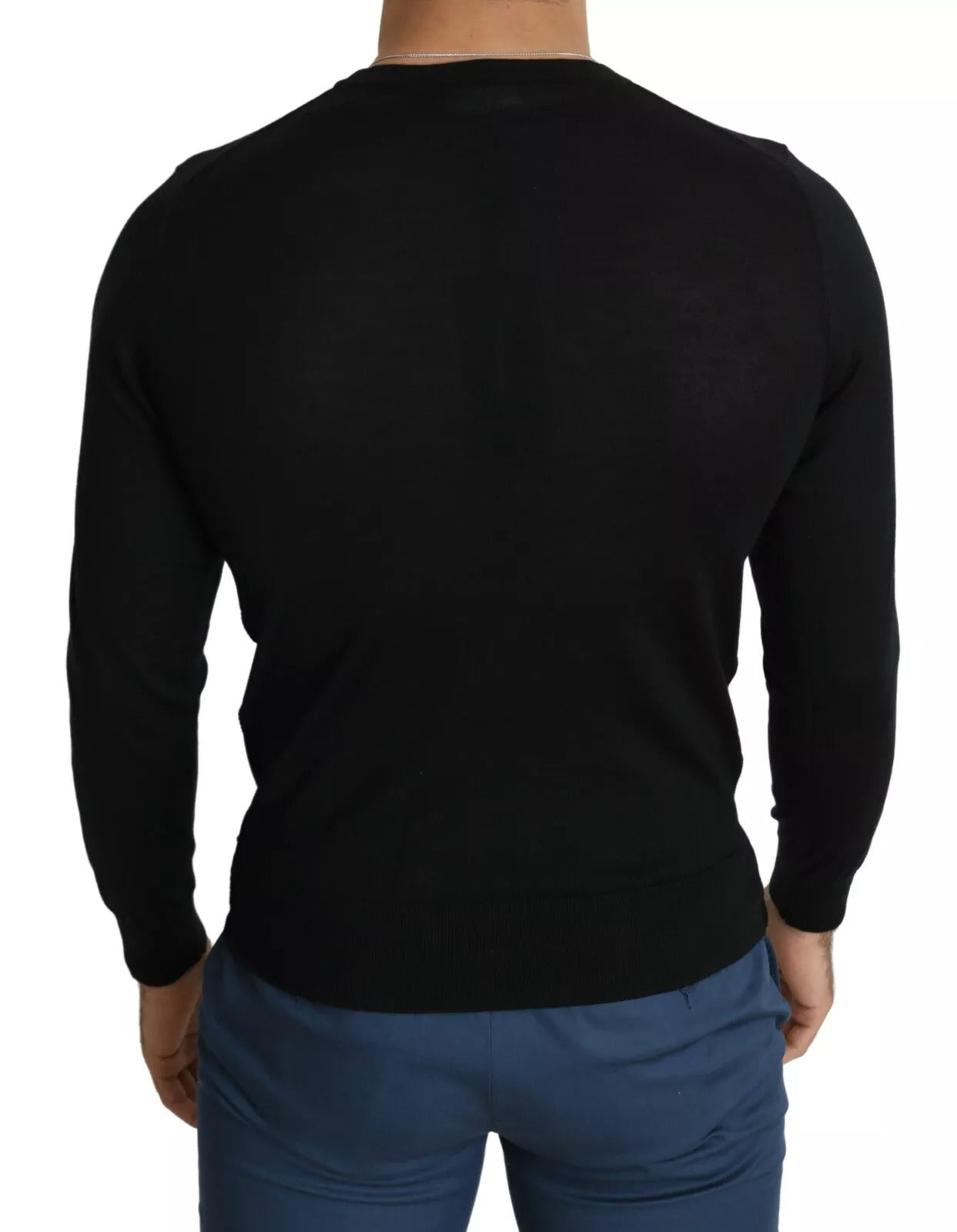 Black long sleeve shirt on a mannequin