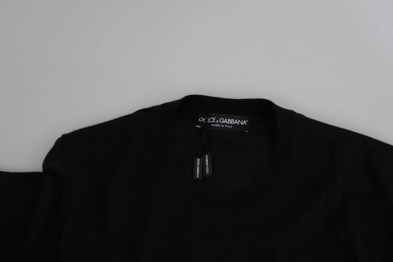 Black shirt on hanger