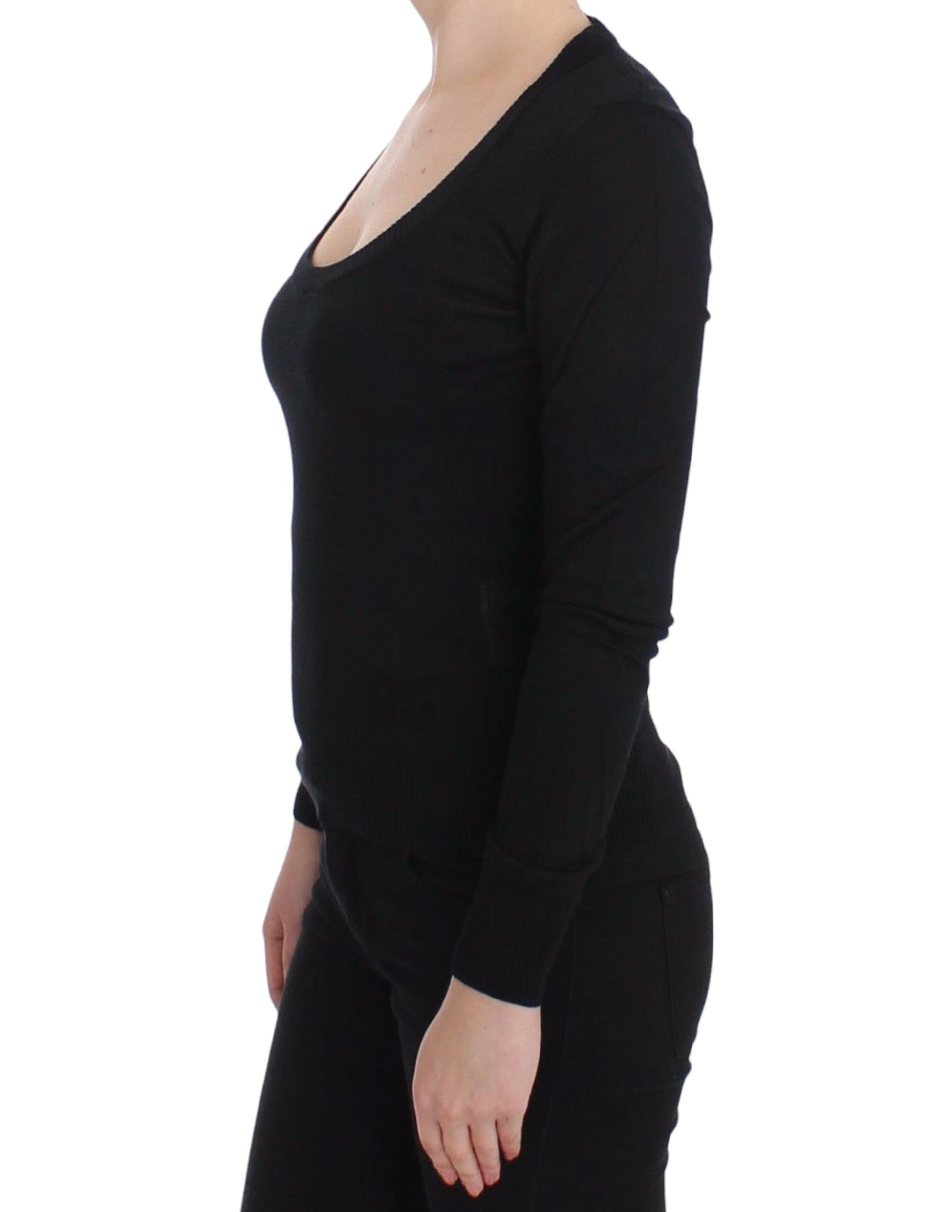 Black long sleeve top on woman