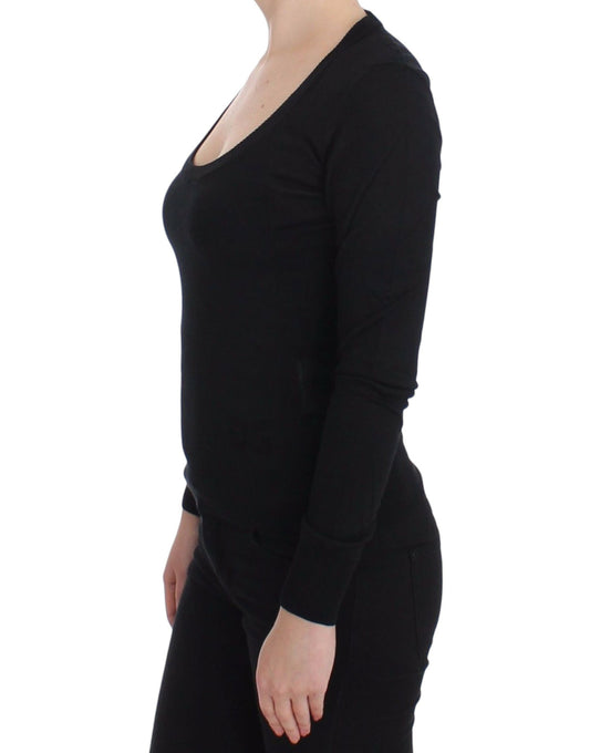 Black long sleeve top on woman