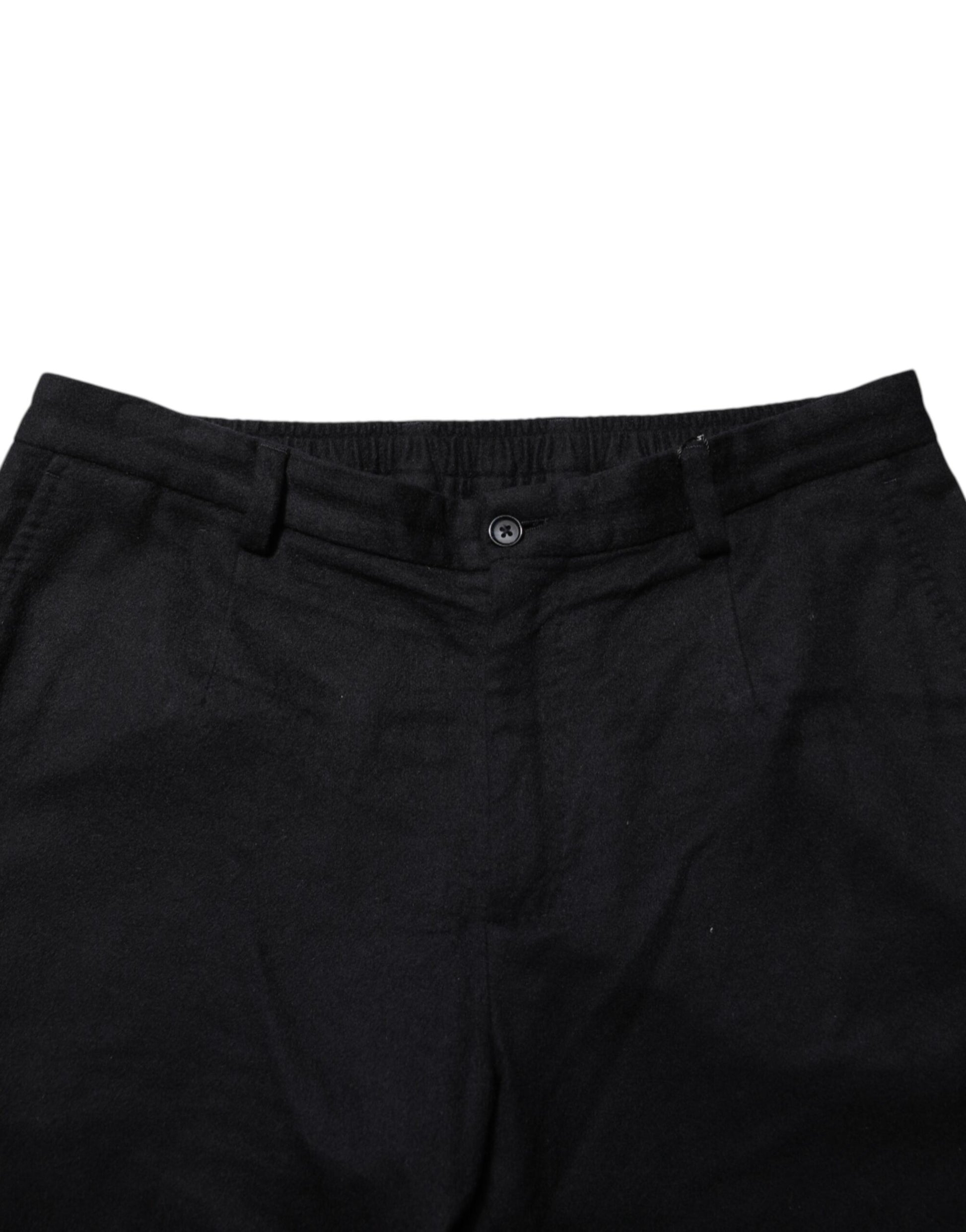 A pair of black cashmere dress pants from the brand Dolce & Gabbana. They are designed for formal men's wear