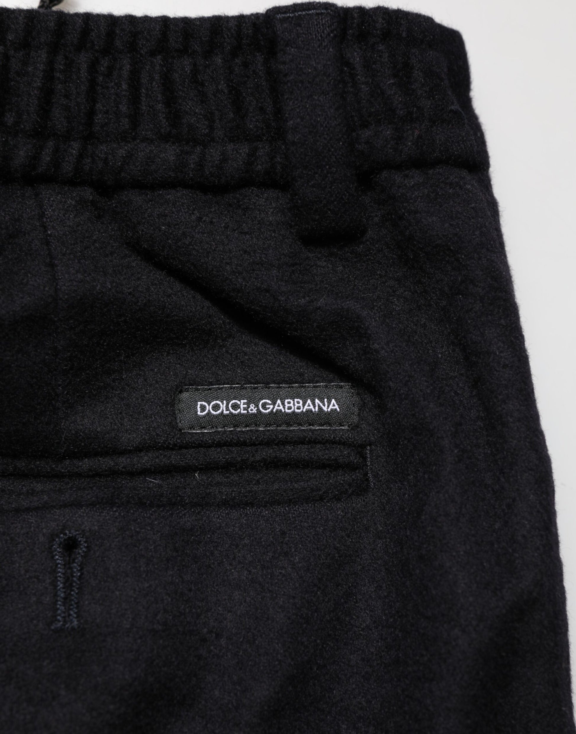 Black cashmere dress pants with Dolce & Gabbana logo on waistband