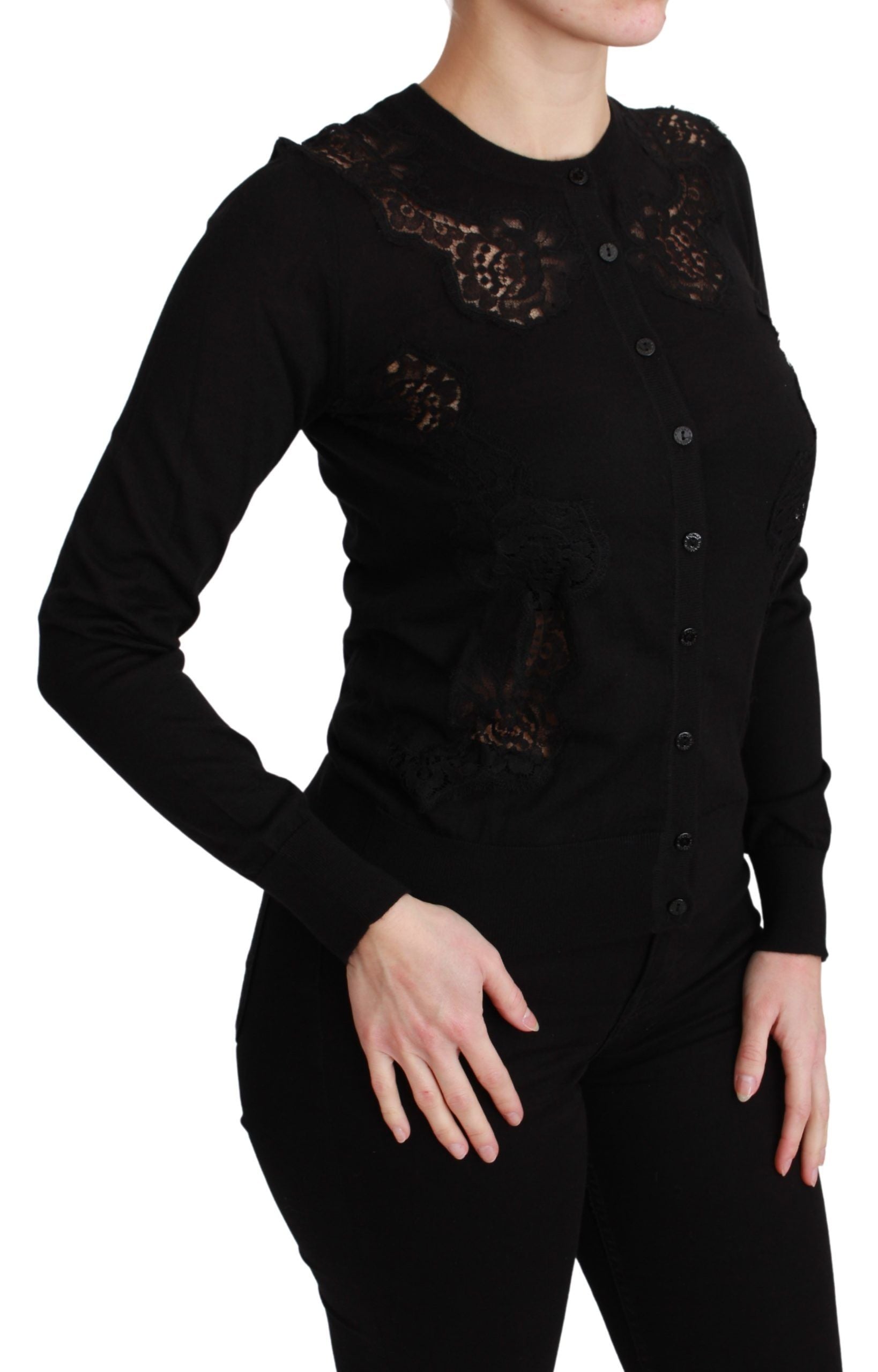 Woman wearing black lace top and pants