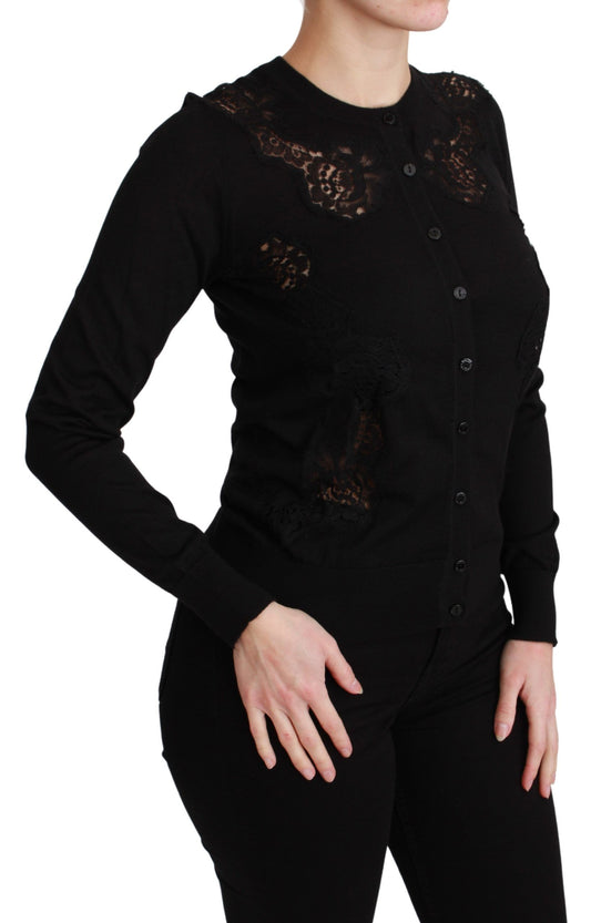 Woman wearing black lace top and pants