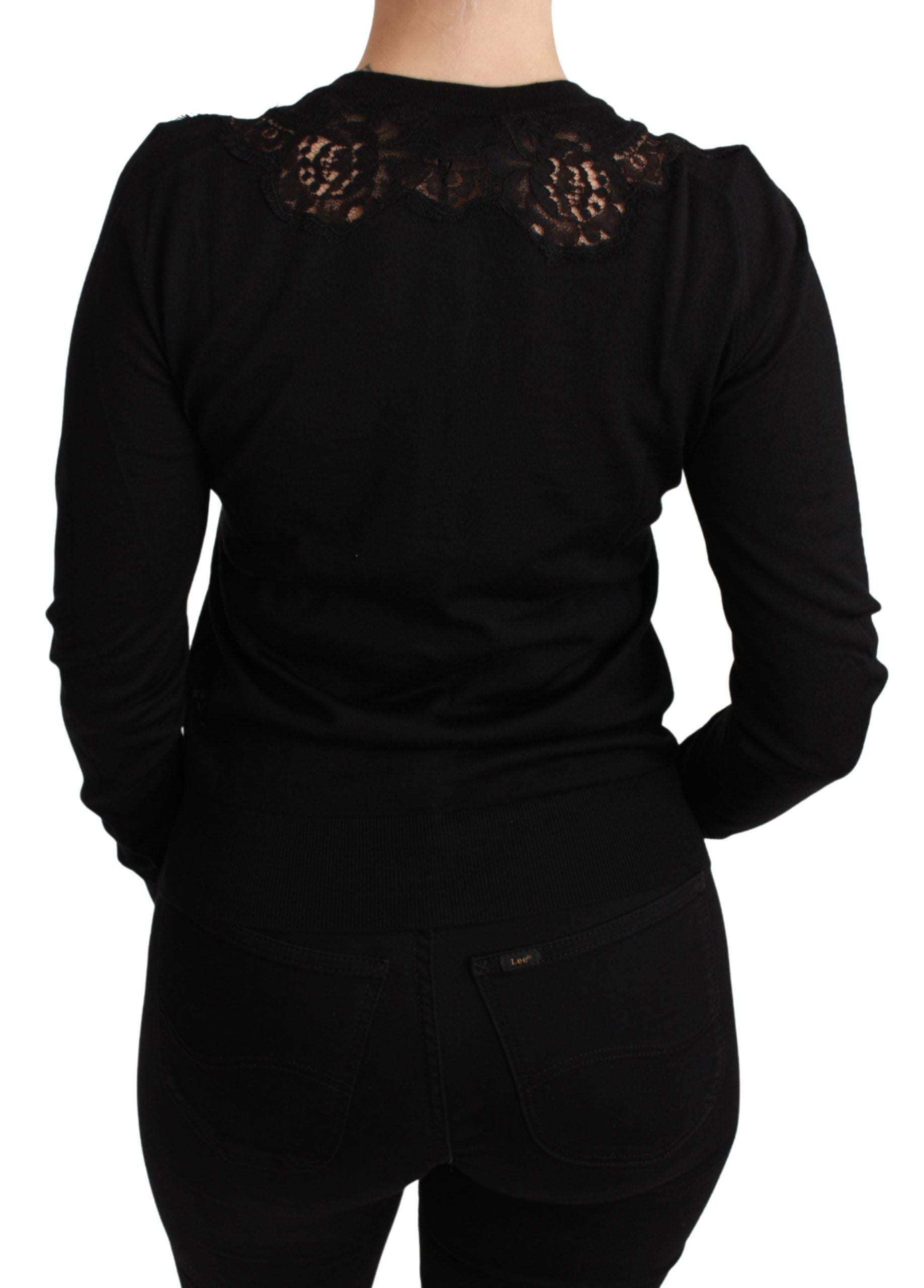 Black long sleeve shirt with lace detailing on back