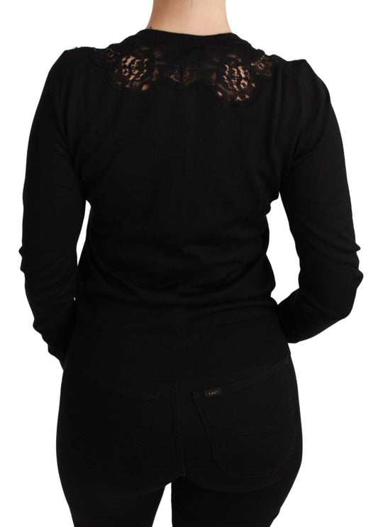 Black long sleeve shirt with lace detailing on back