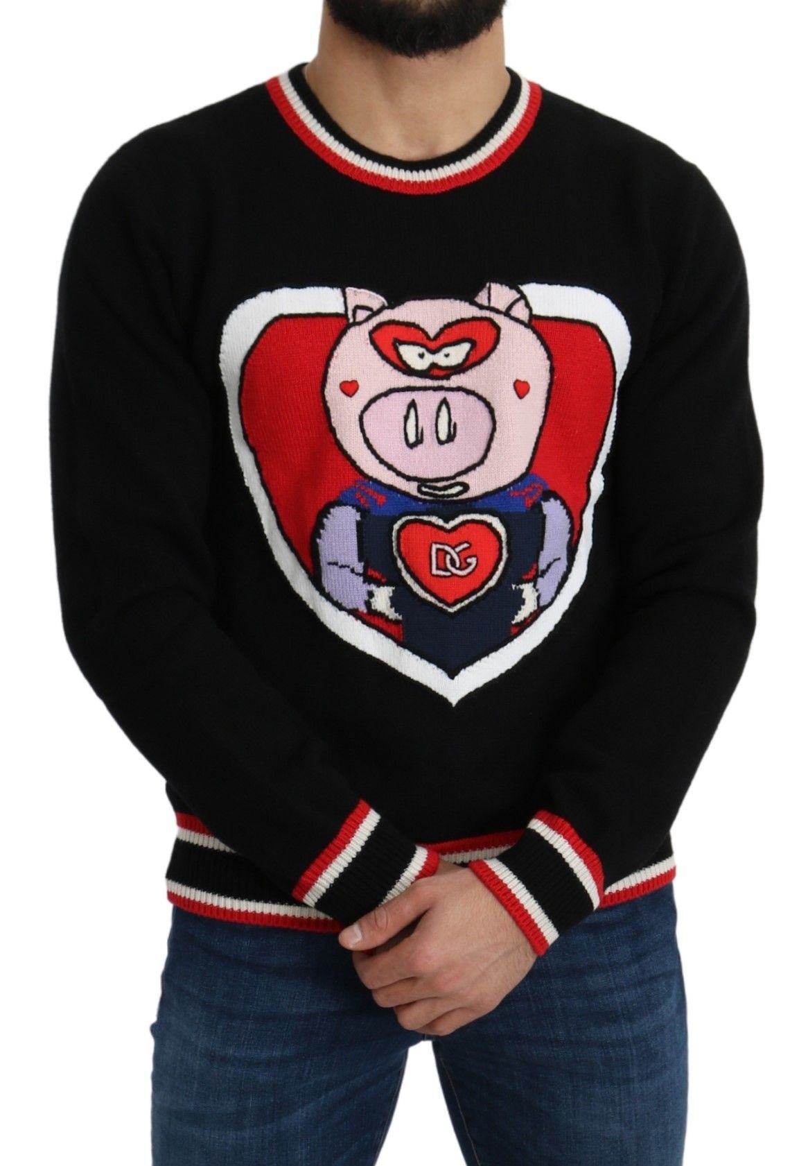 Man wearing a sweater with a pig design on the front
