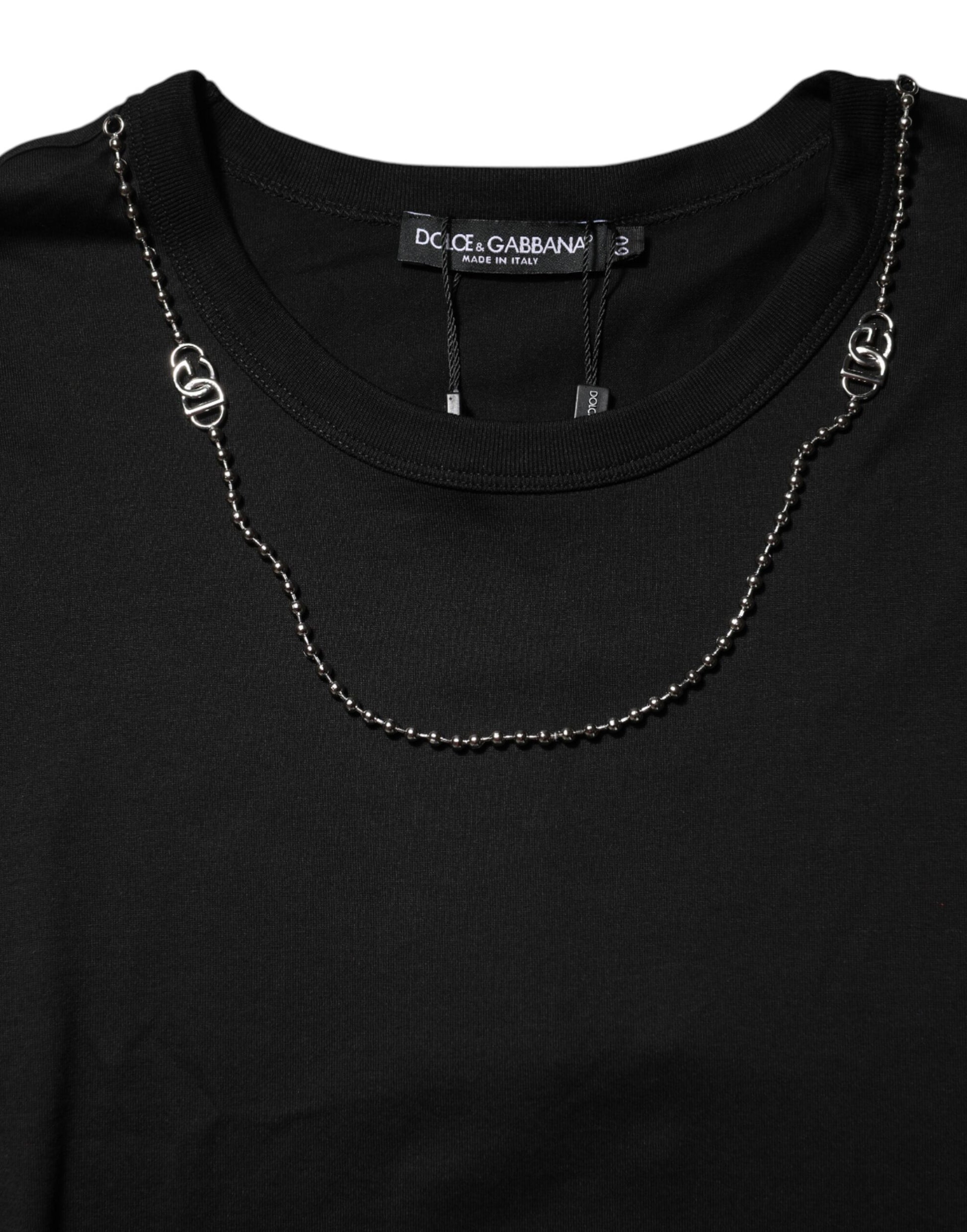 Black sweater with silver chain necklace