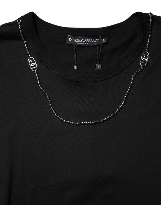 Black sweater with silver chain necklace