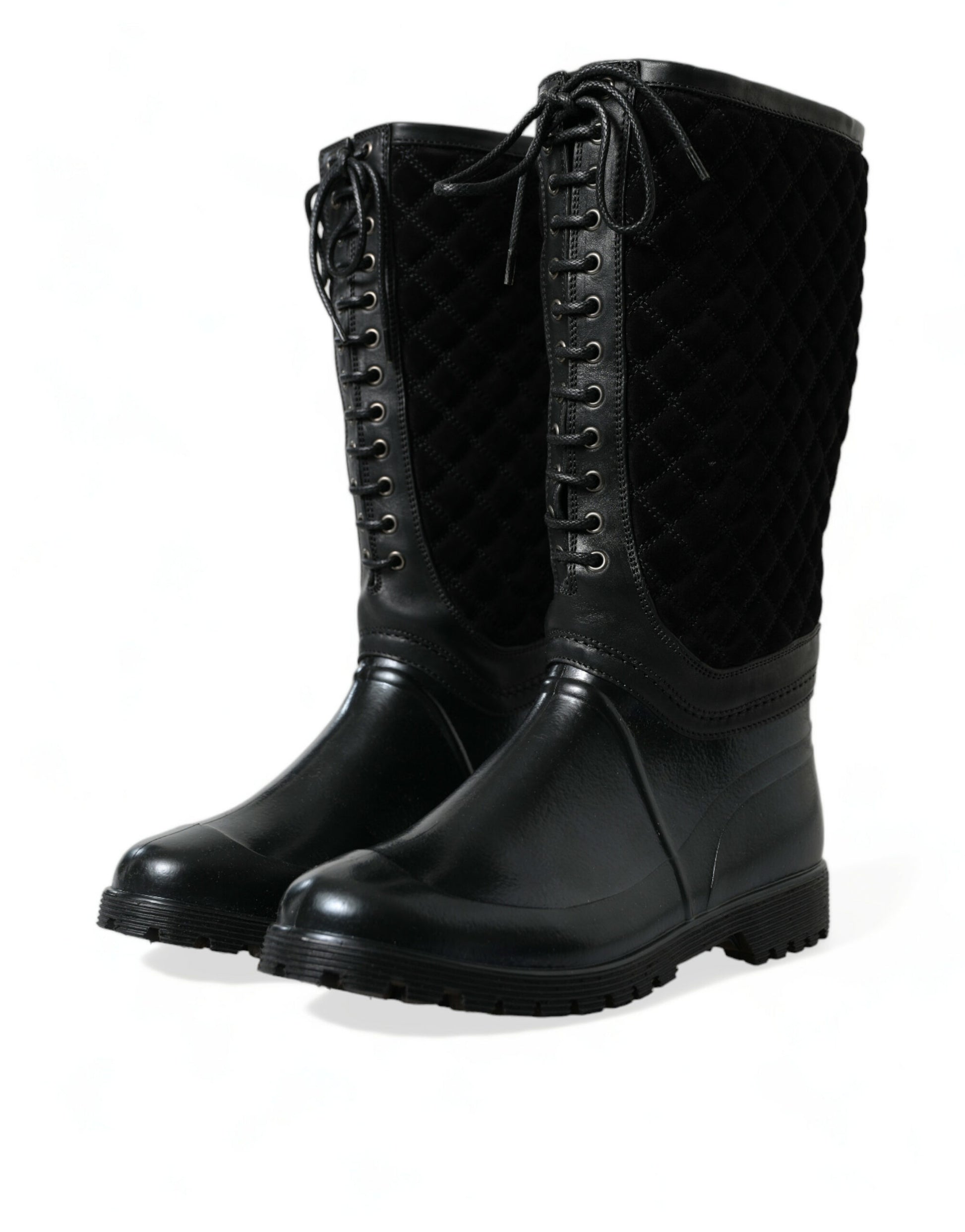 Pair of black leather boots with laces and buckles