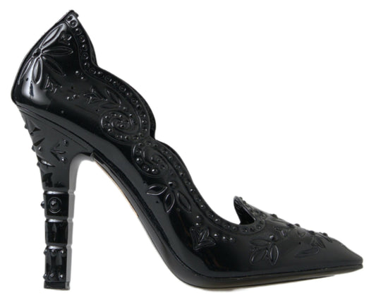 Black high heel shoe with decorative design on top and bottom