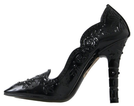 Black high heel shoe with decorative design on toe and side