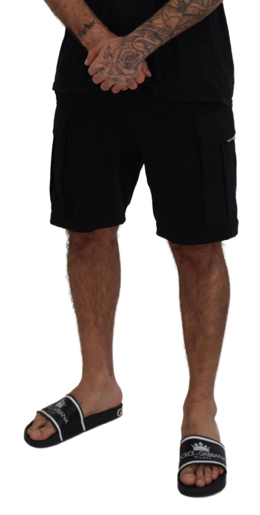 Man wearing black shorts and flip flops