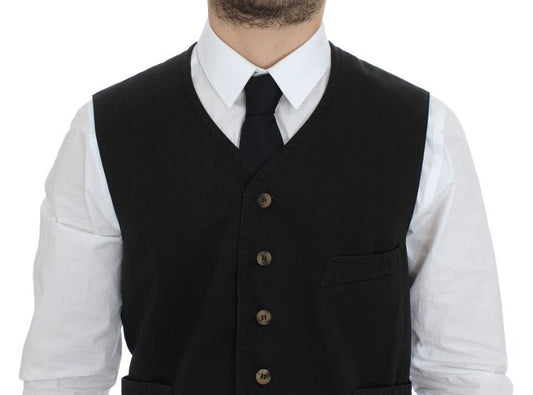 A black vest with a buttoned front and two pockets on the chest