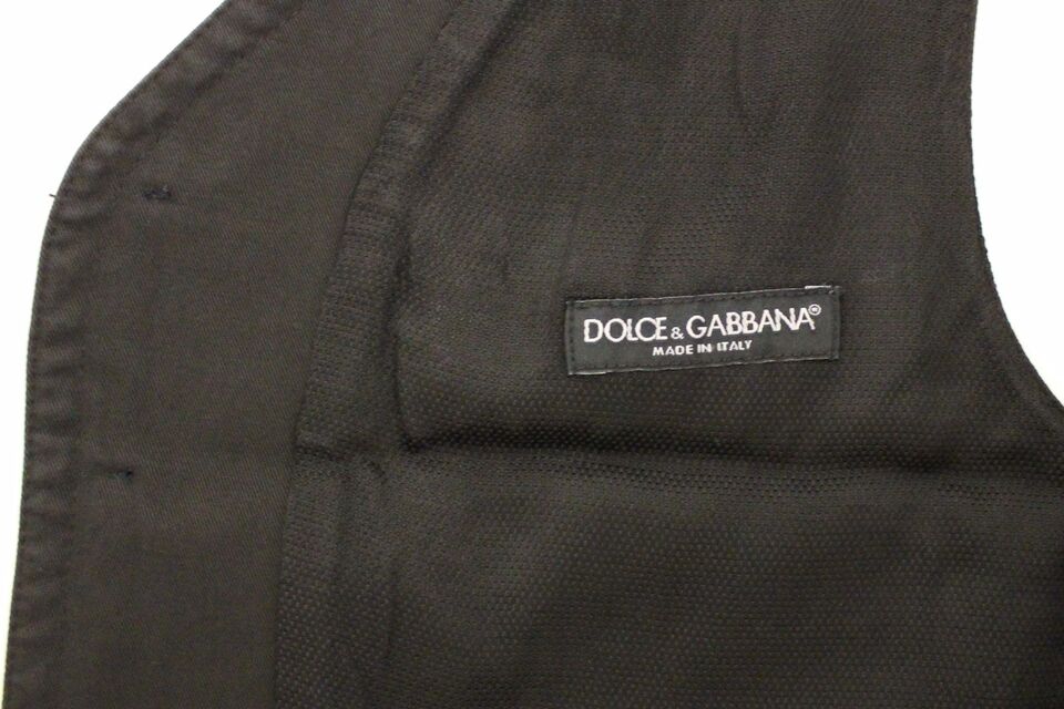 A black cotton blend vest from Dolce & Gabbana, featuring a label on the left chest
