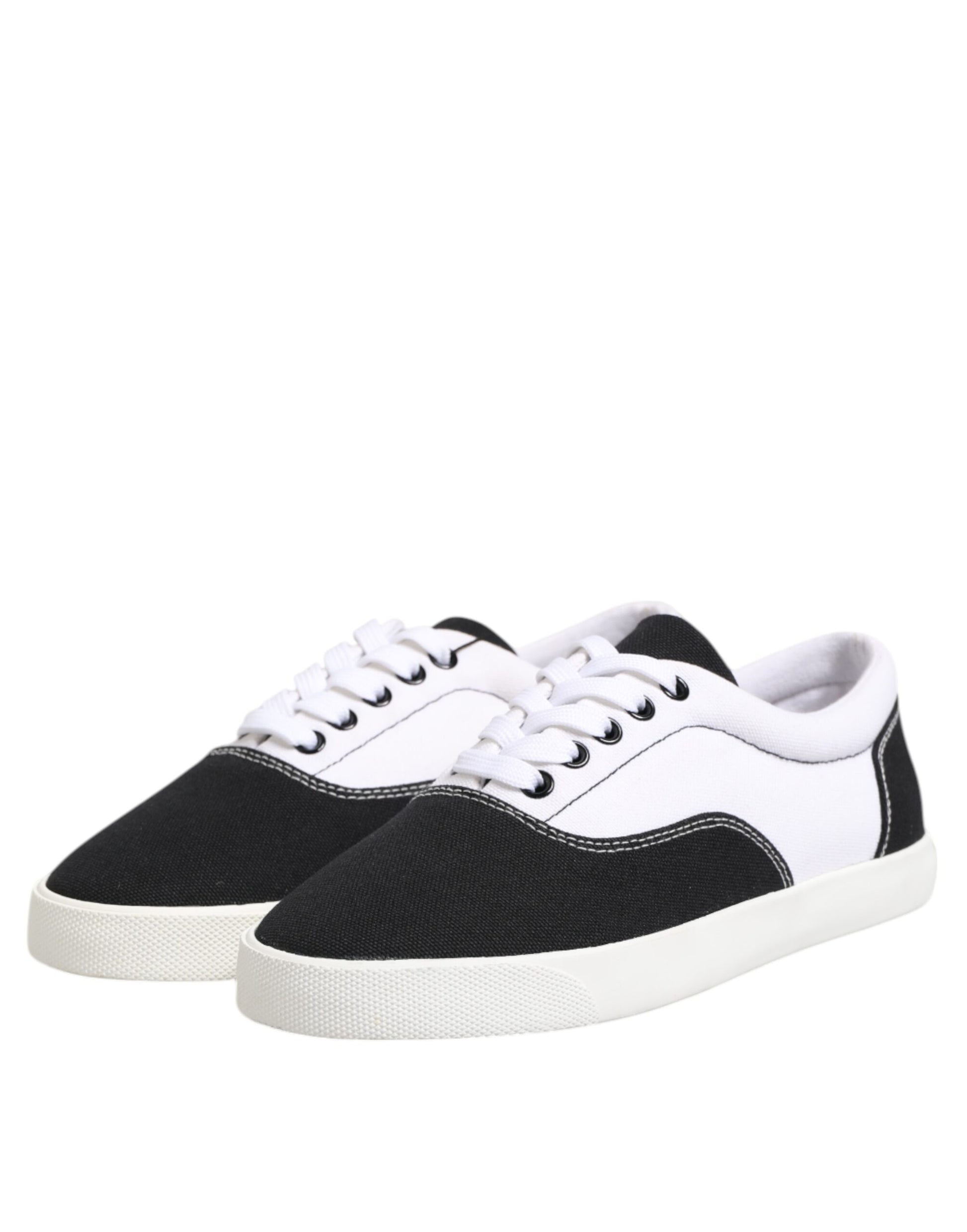 Pair of black and white sneakers with laces
