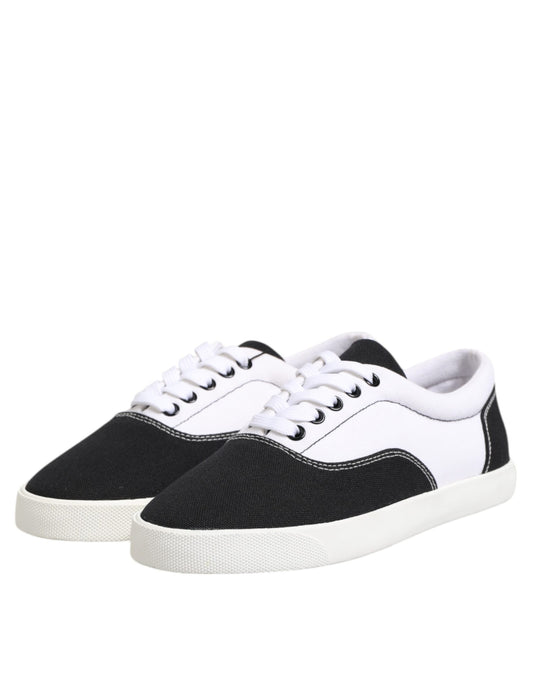 Pair of black and white sneakers with laces