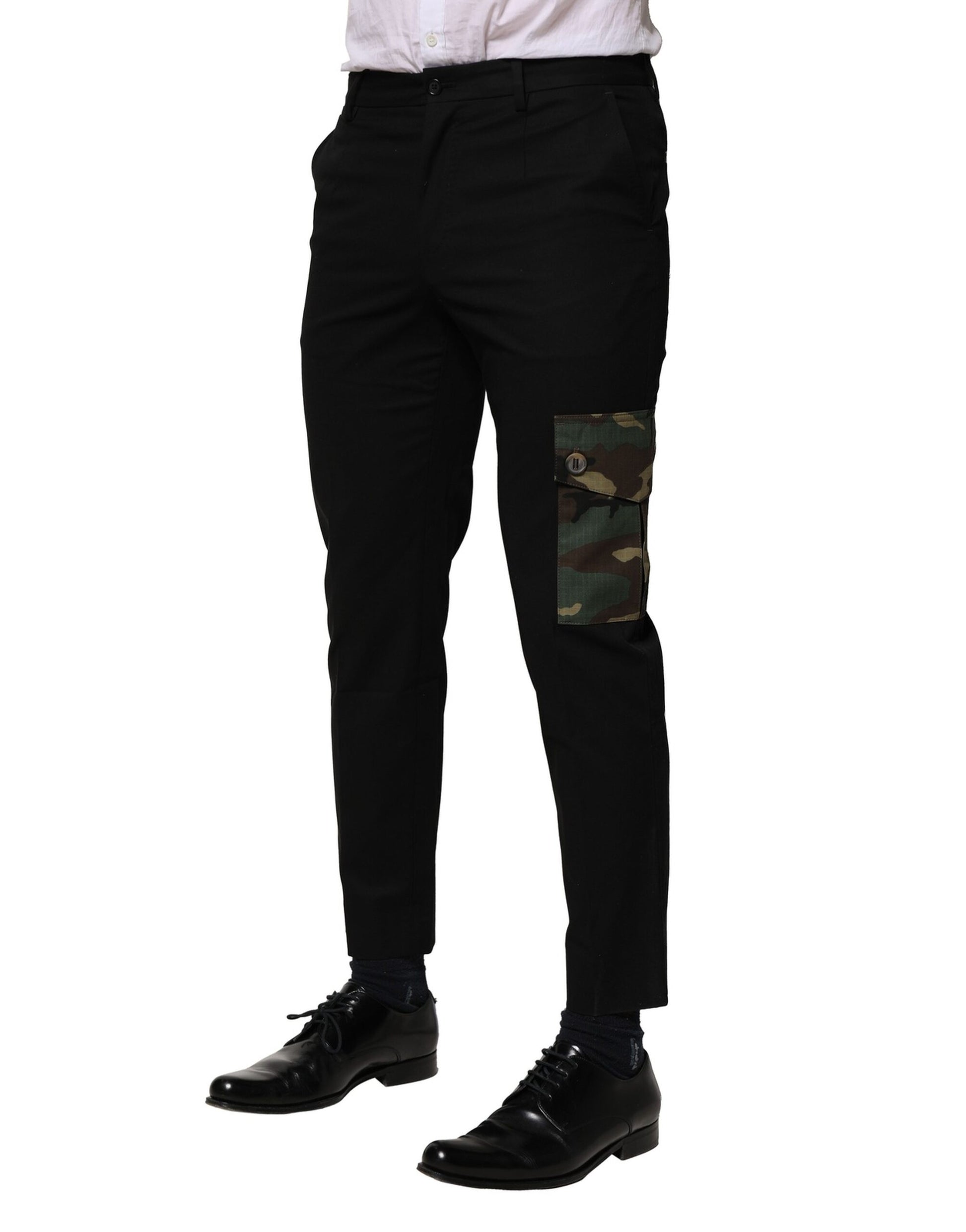 A pair of black cotton cargo pants with camouflage pattern on the knees, designed by Dolce & Gabbana