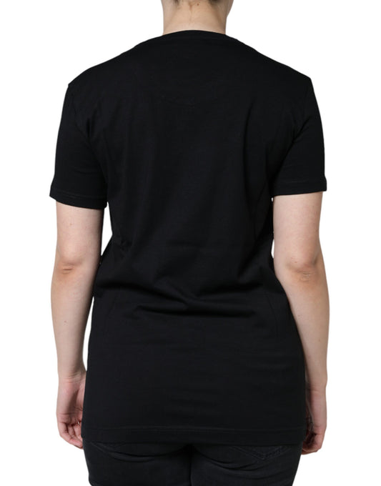 Black short sleeved shirt on a person from behind