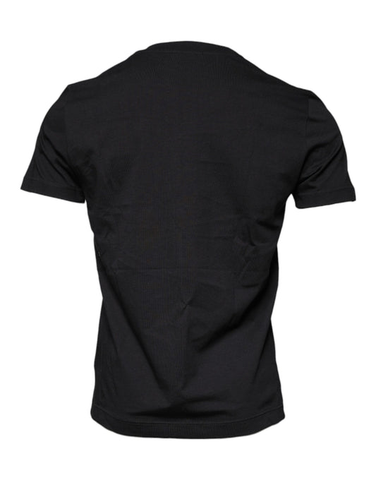 Black short sleeve shirt on a hanger