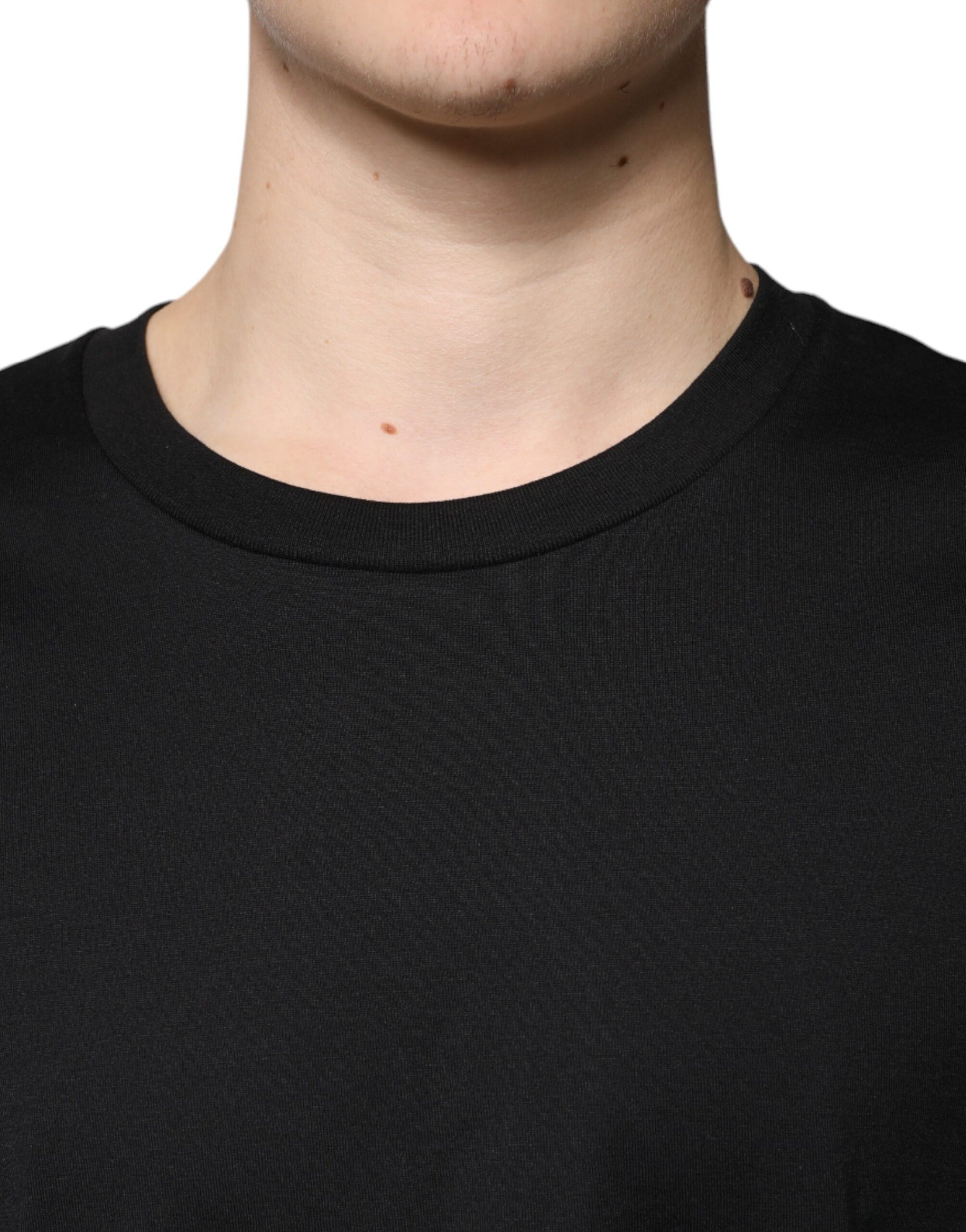 Man wearing black turtleneck sweater