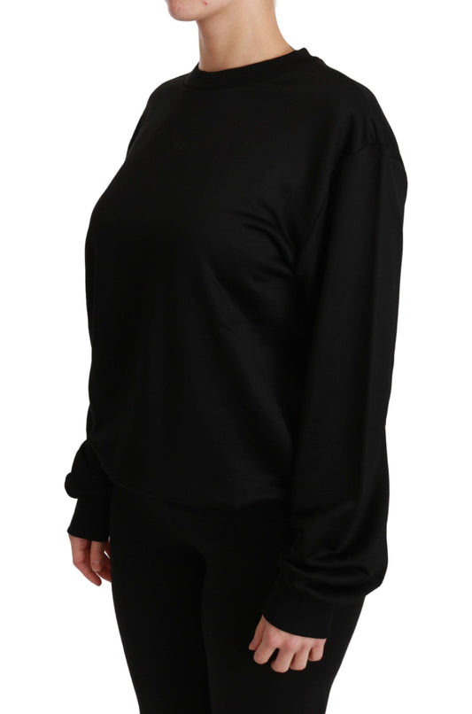 Long sleeve black shirt on a person
