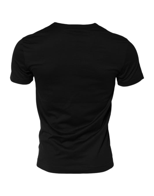 Black short sleeve t-shirt on a hanger