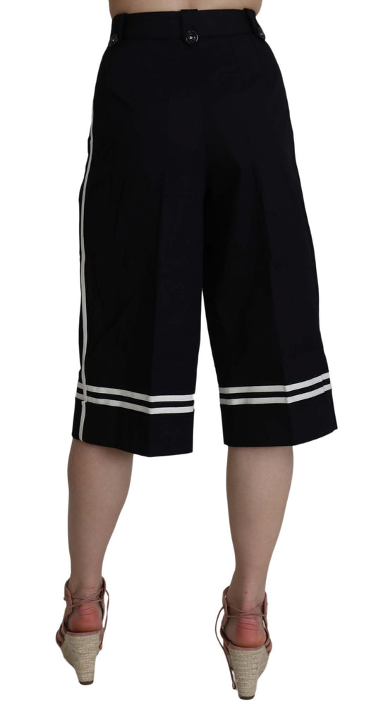 Pair of black shorts with white stripes on sides