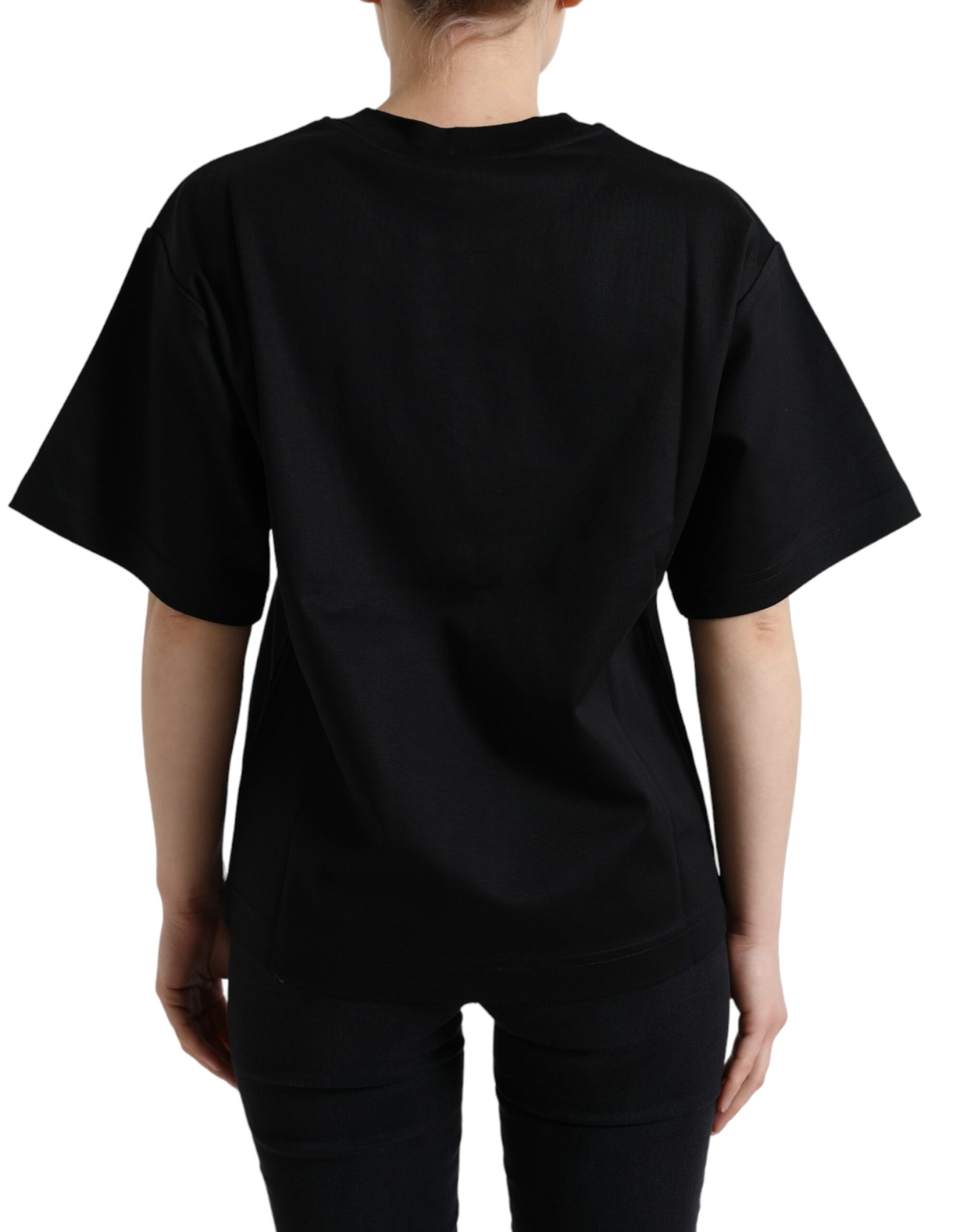 Black short sleeved t-shirt on a person
