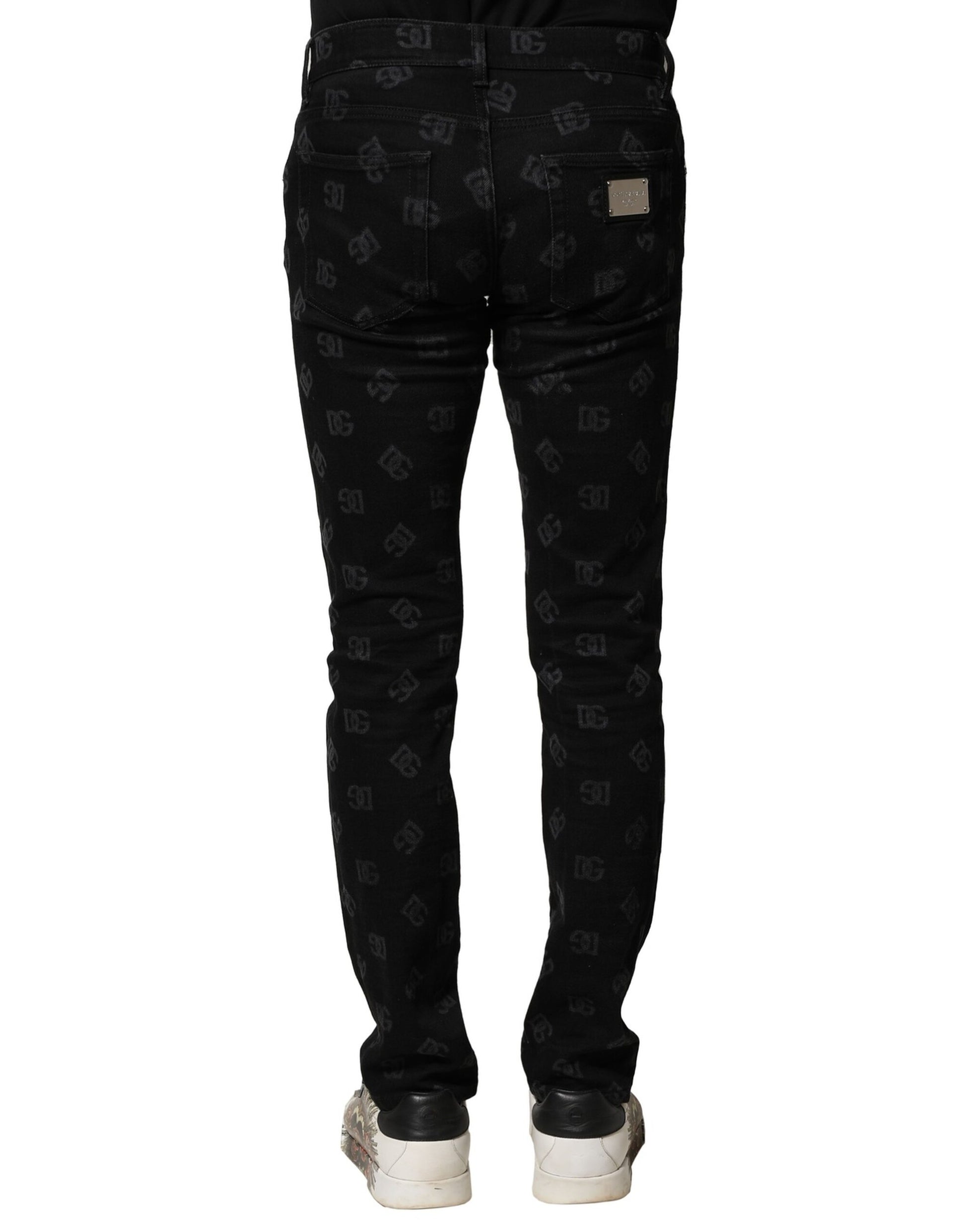 Pair of black jeans with a patterned design on legs
