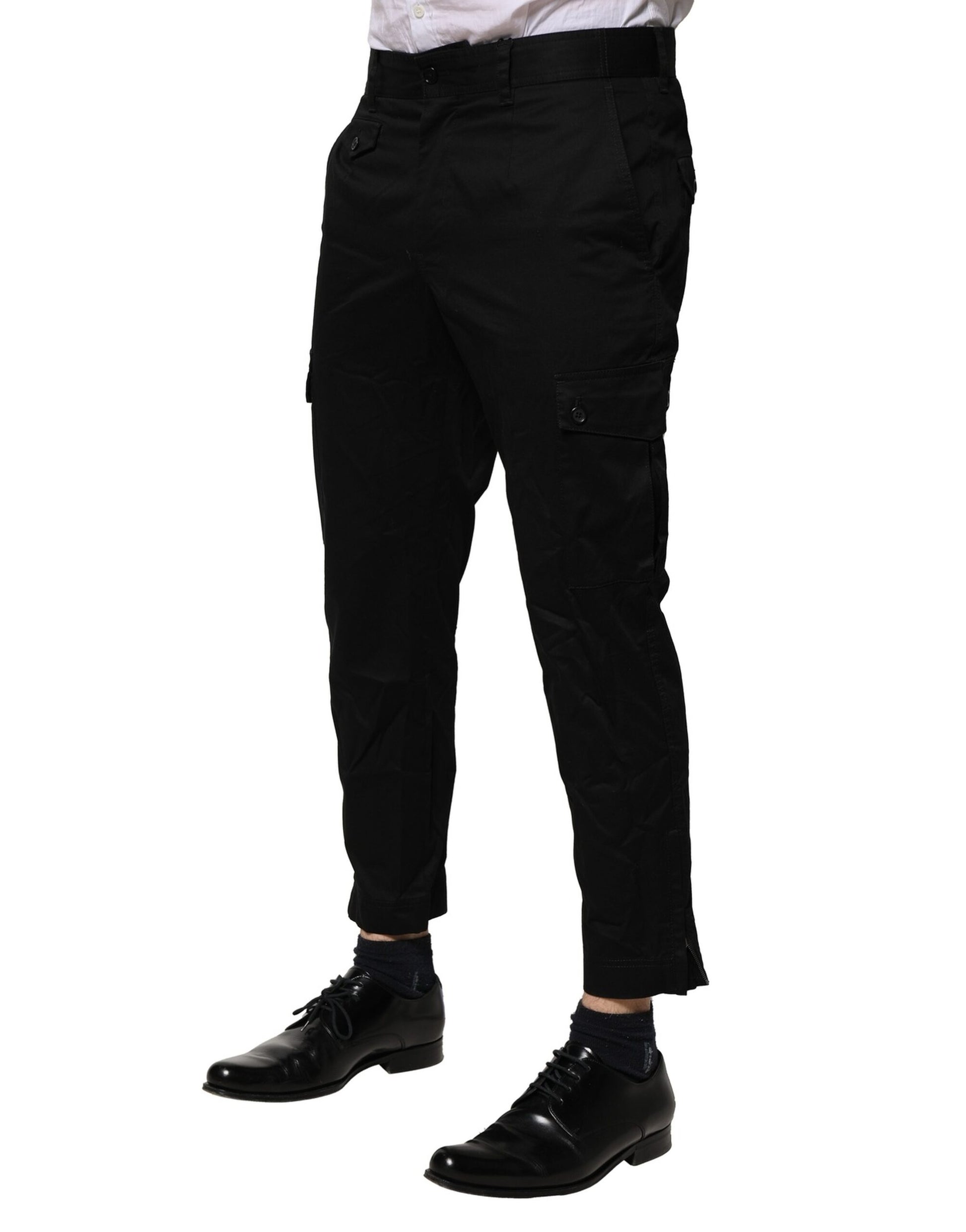 A pair of black cotton dress pants from Dolce & Gabbana, featuring a slim fit and formal design