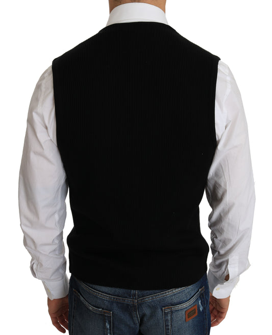 A black woven waistcoat with a V-neck and long sleeves