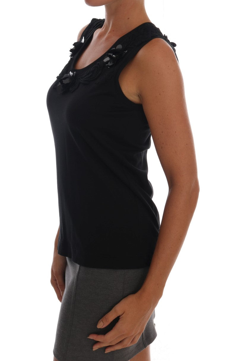 Black sleeveless top on woman