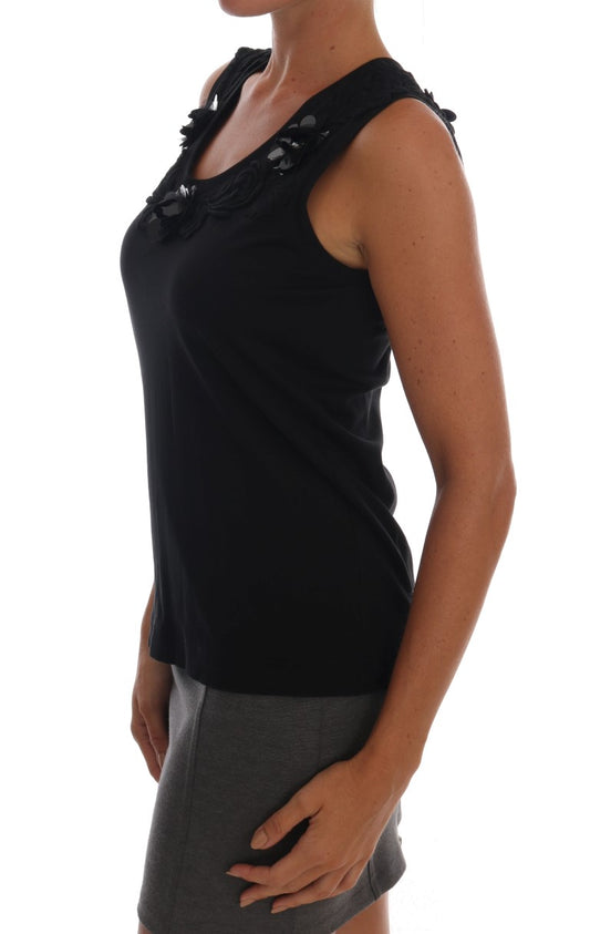 Black sleeveless top on woman