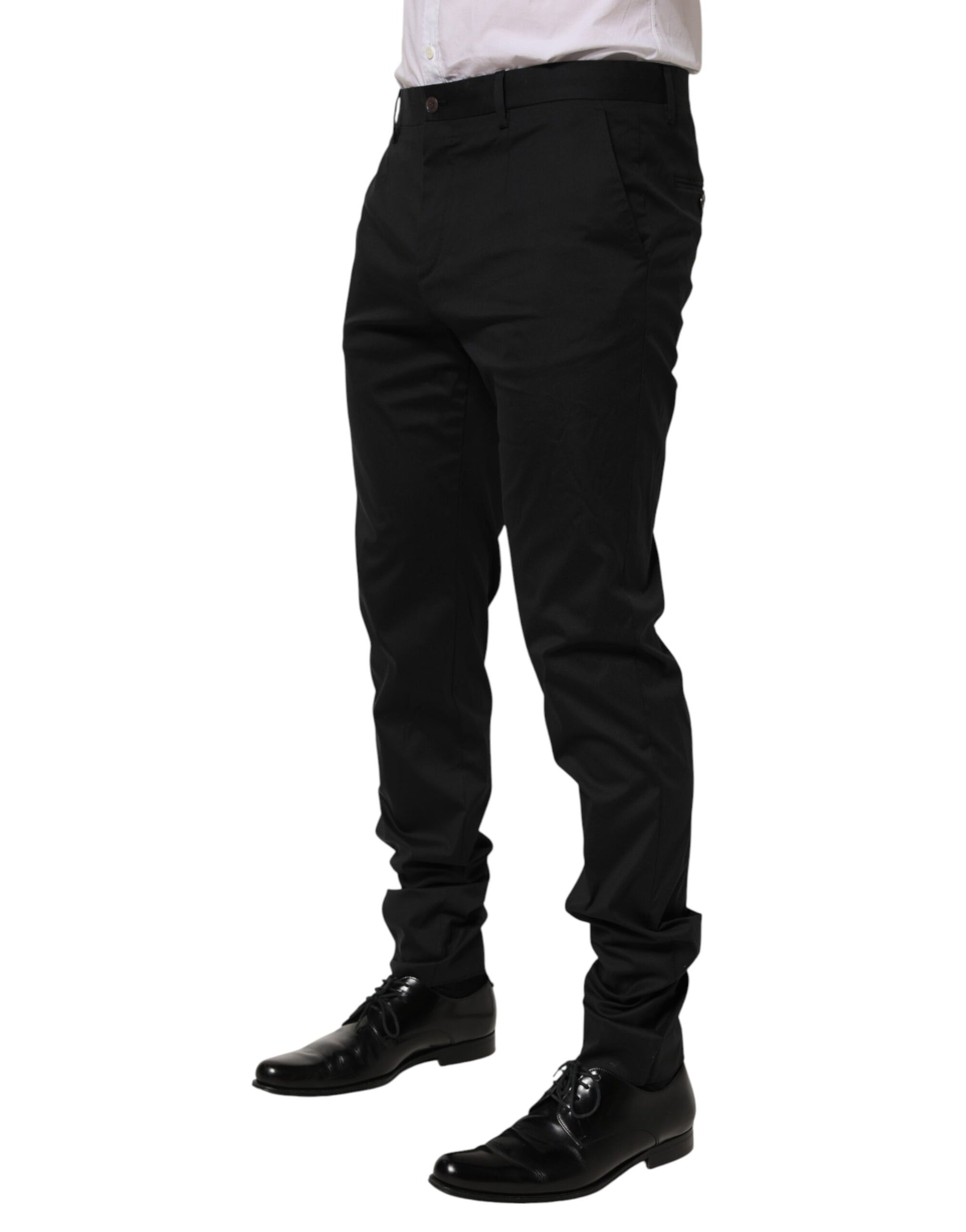 A pair of black cotton formal dress pants from the brand Dolce & Gabbana. They are designed for men and featu