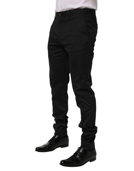 A pair of black cotton formal dress pants from the brand Dolce & Gabbana. They are designed for men and featu