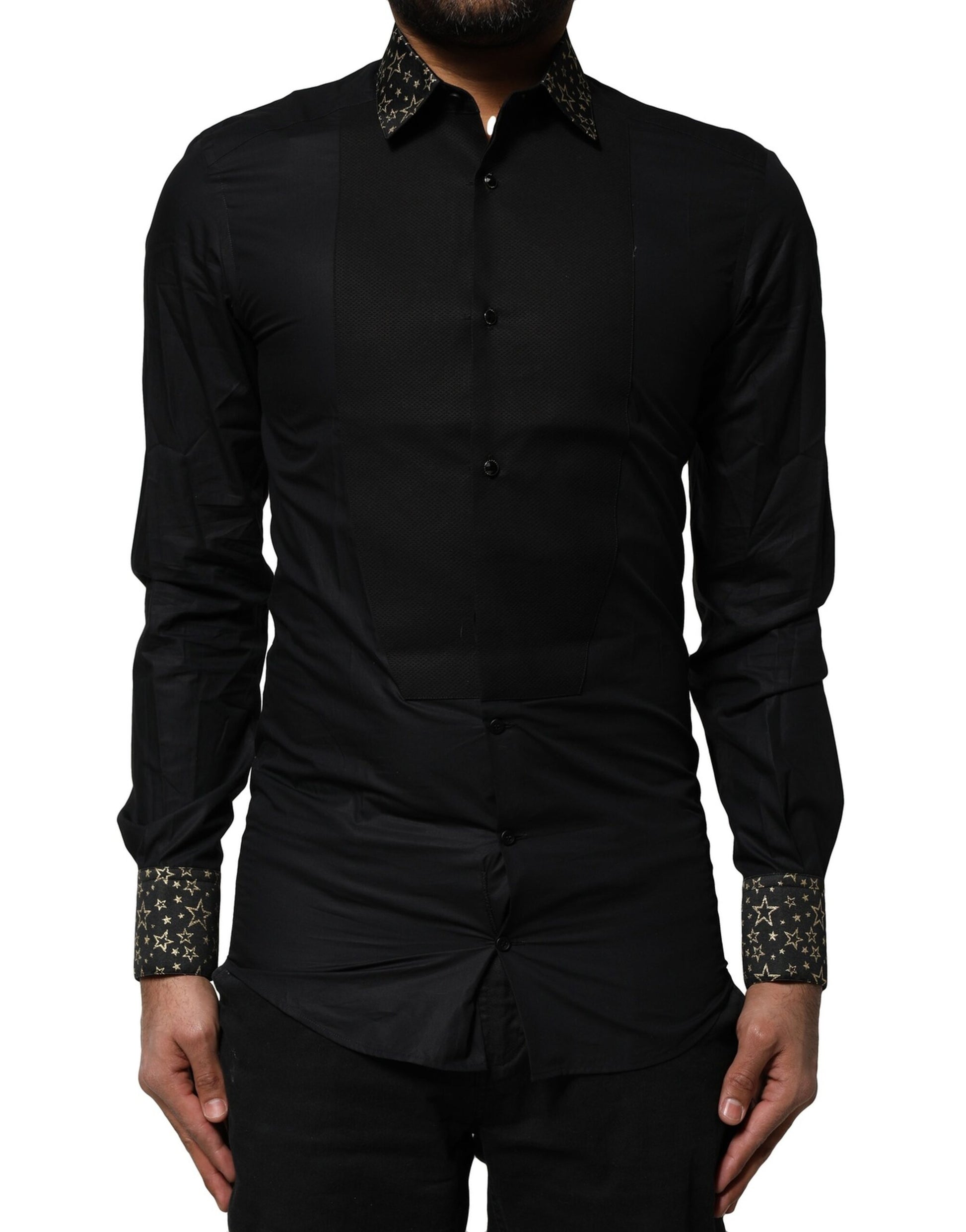A black cotton dress shirt with gold accents on the sleeves
