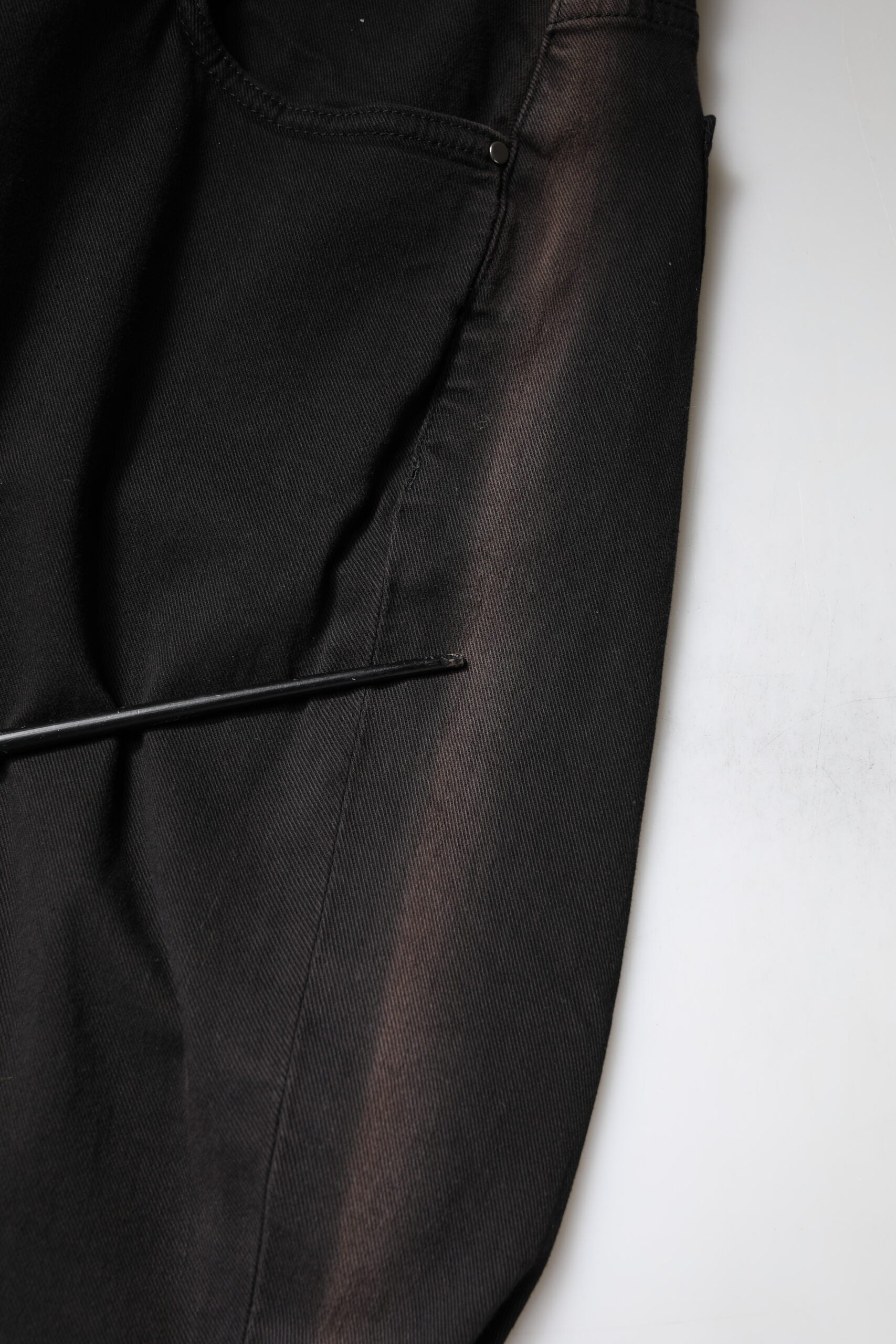 Black suit jacket with lace detailing on sleeve