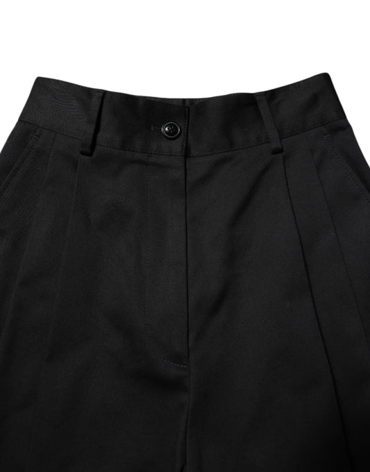 Pair of black trousers with a patterned design