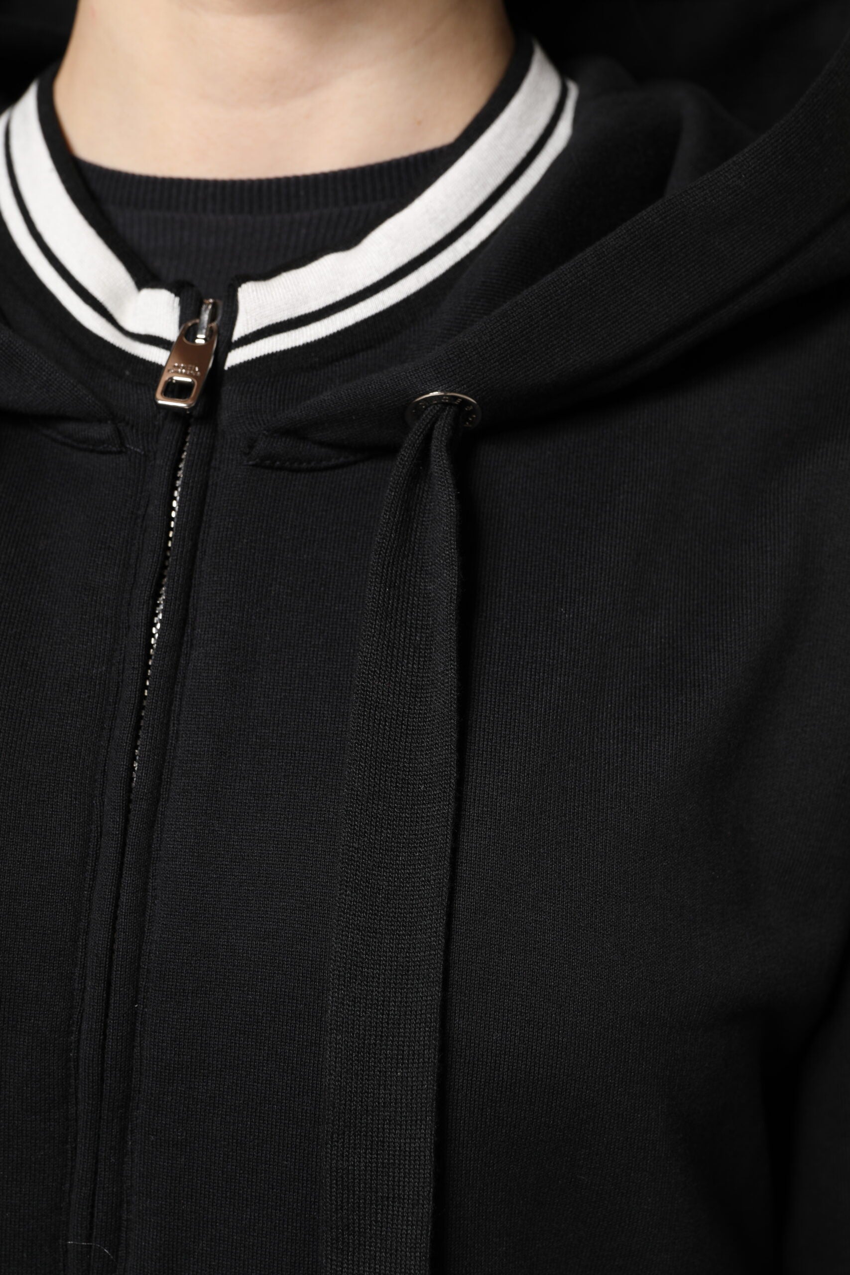 Black hoodie with zippered front pocket