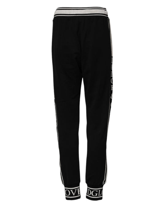 Pair of black sweatpants with white stripe on side