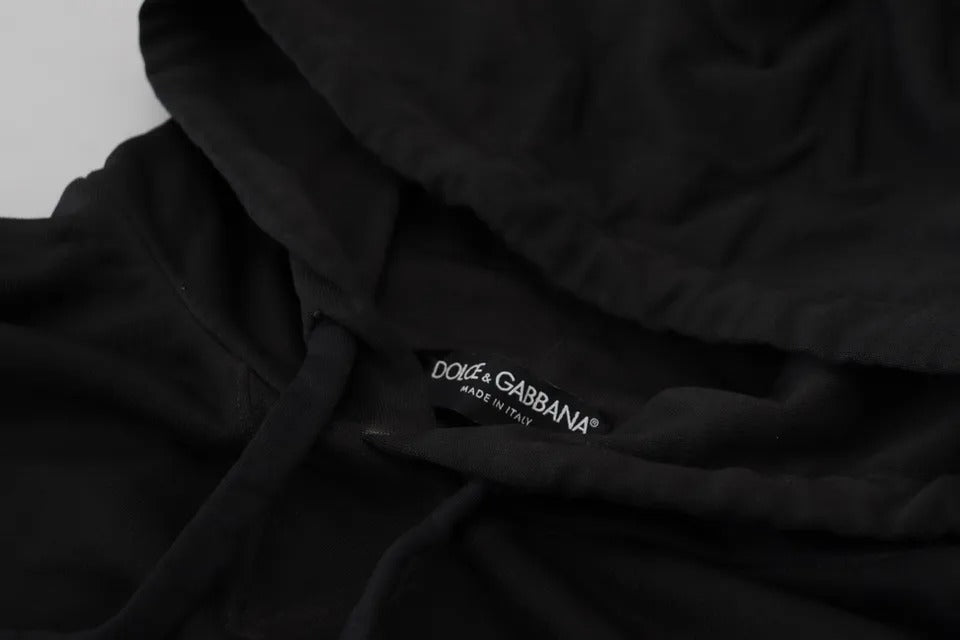 Black hoodie on a white surface