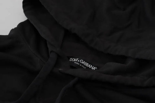 Black hoodie on a white surface
