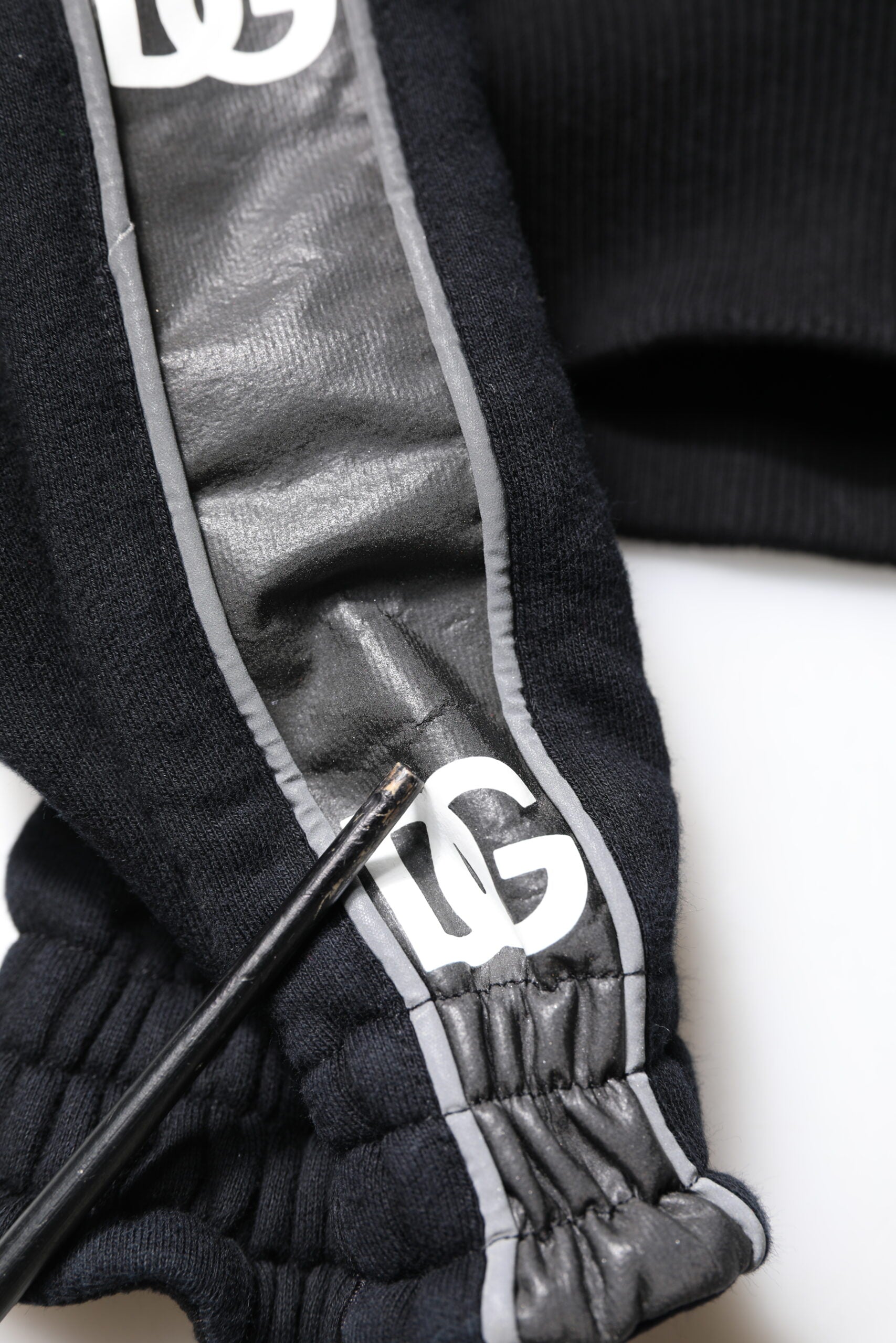 Black sportswear with white logo