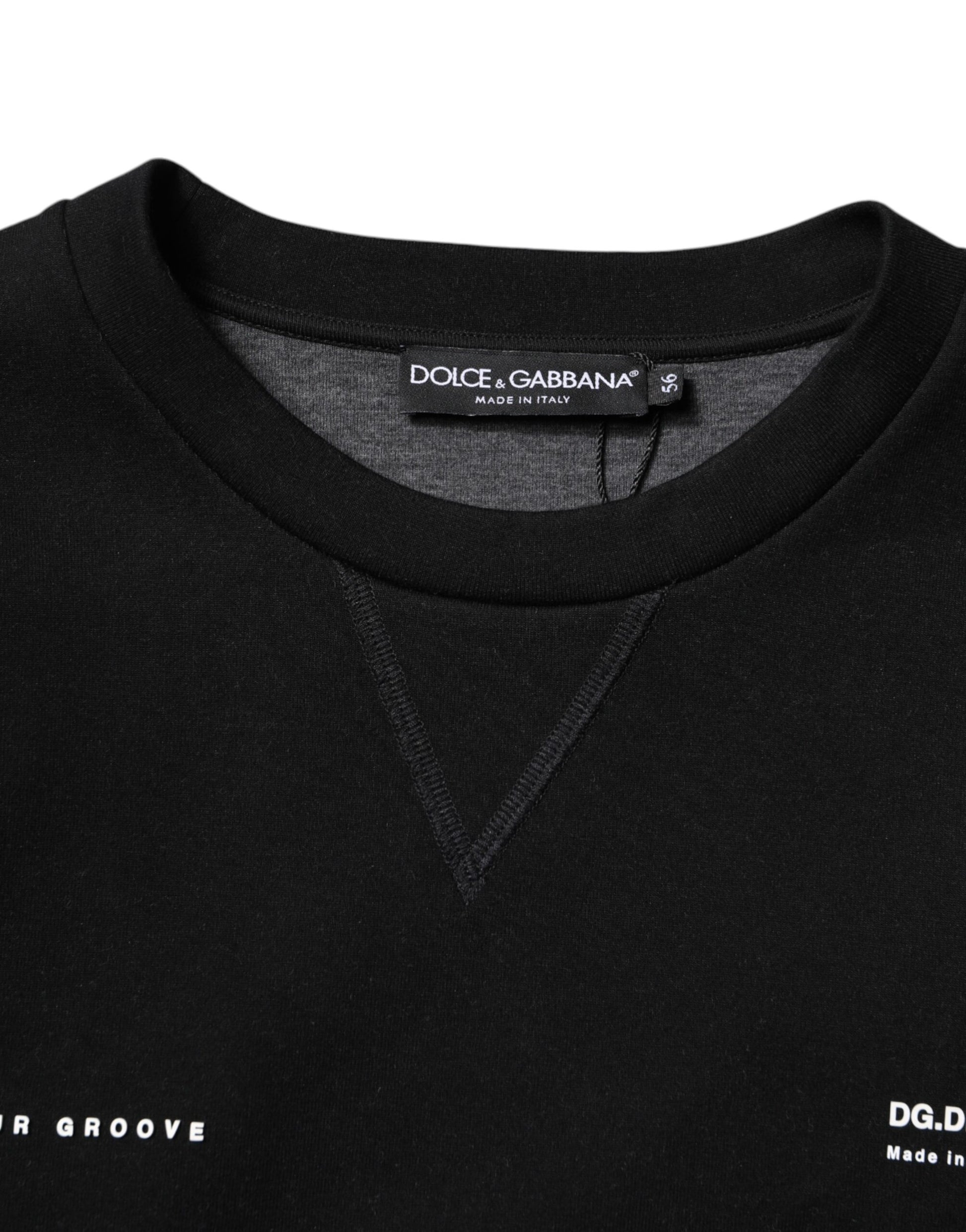 Black long sleeve shirt on hanger
