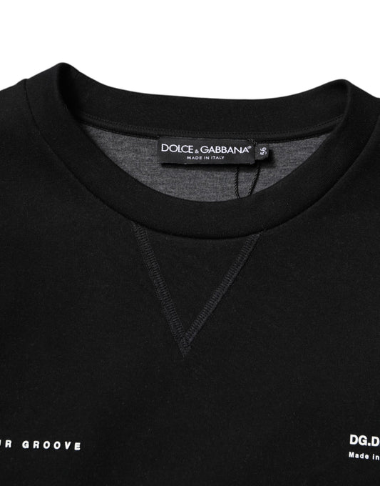 Black long sleeve shirt on hanger