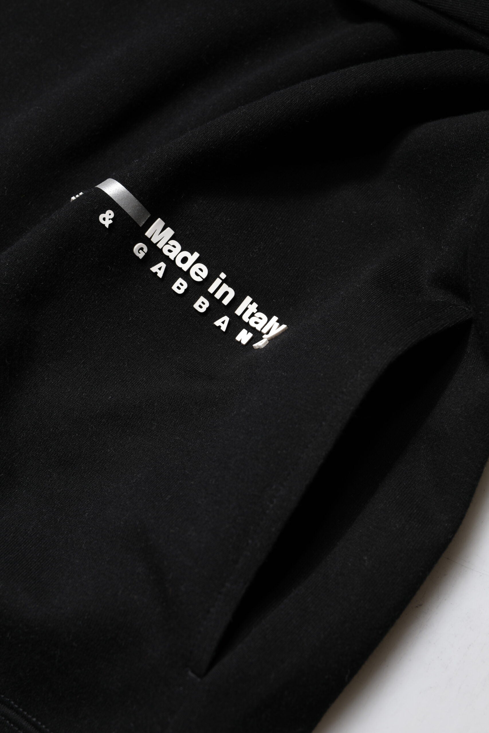 Black sweatshirt with white logo on front